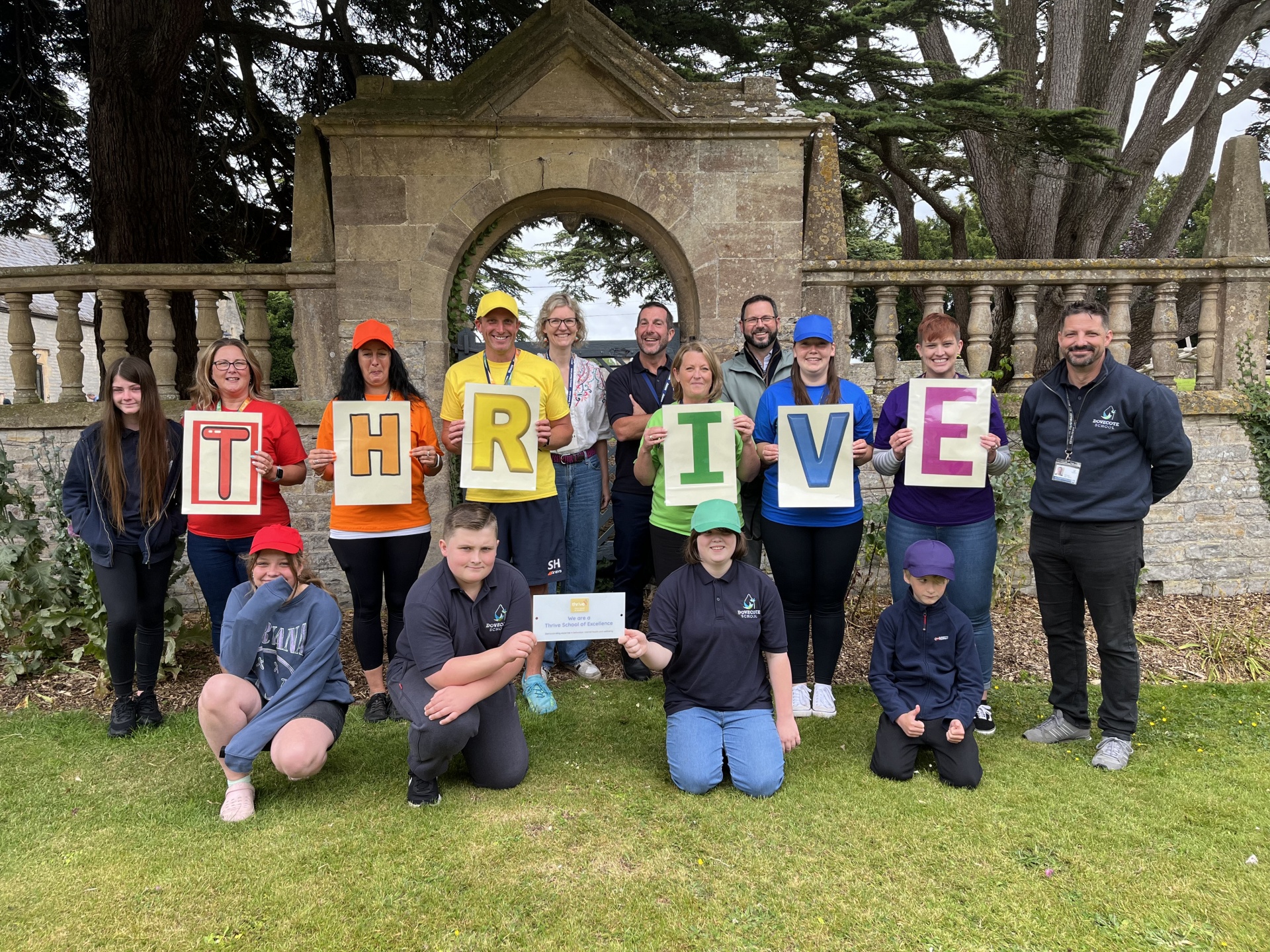 Staff and pupils at Dovecote School